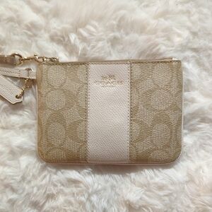 Coach Cream Clutch with Gold Zipper and Signature Pattern